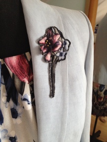 View 2 in tulip viscose with bought jacket and lily motif from fabric on lapel