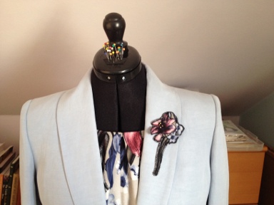 View 2 in tulip viscose with bought jacket and lily motif from fabric on lapel